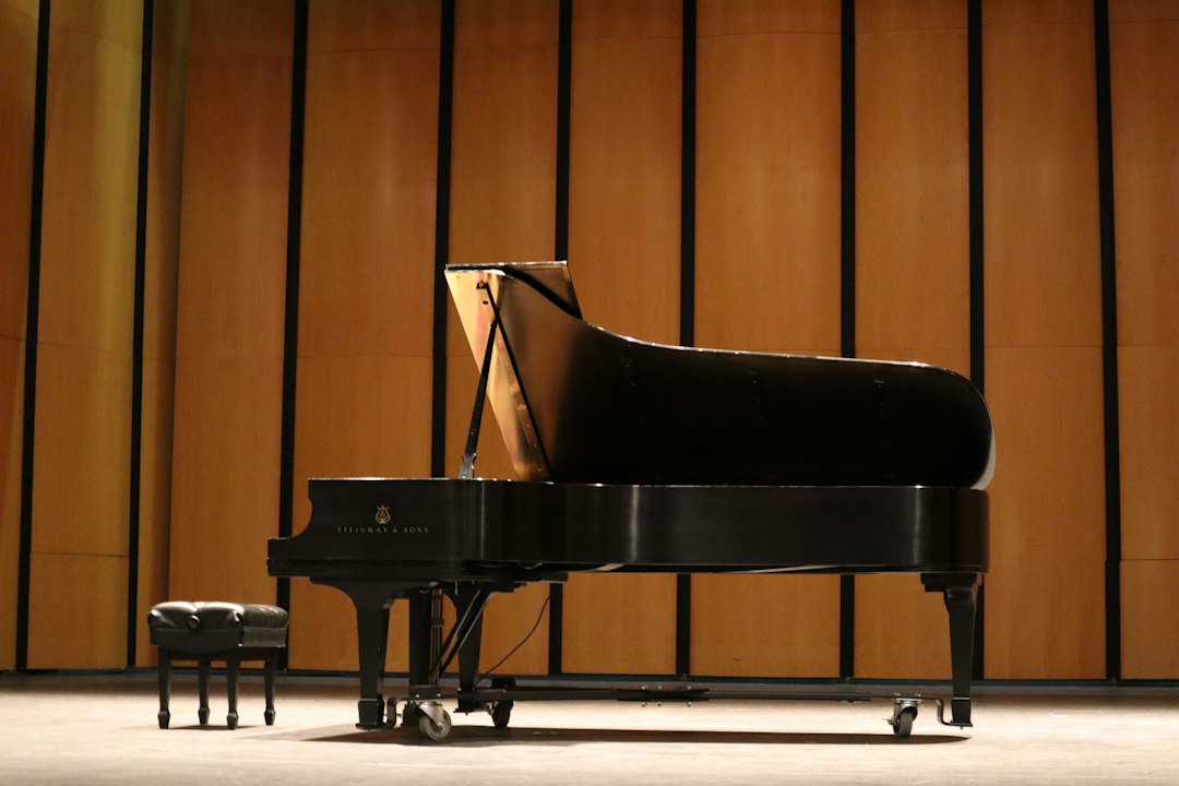 Grand piano illustrating Per Asplin's music career; not a portrait