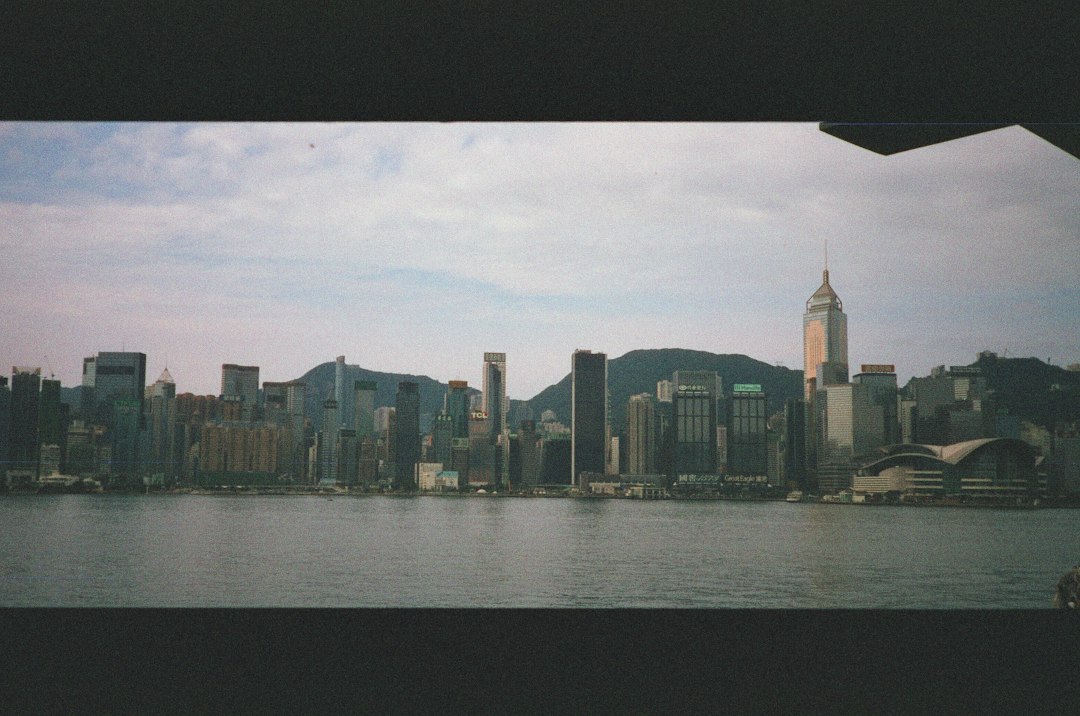 Hong Kong cityscape illustrating Nina Li Chi's film-era background; not a portrait
