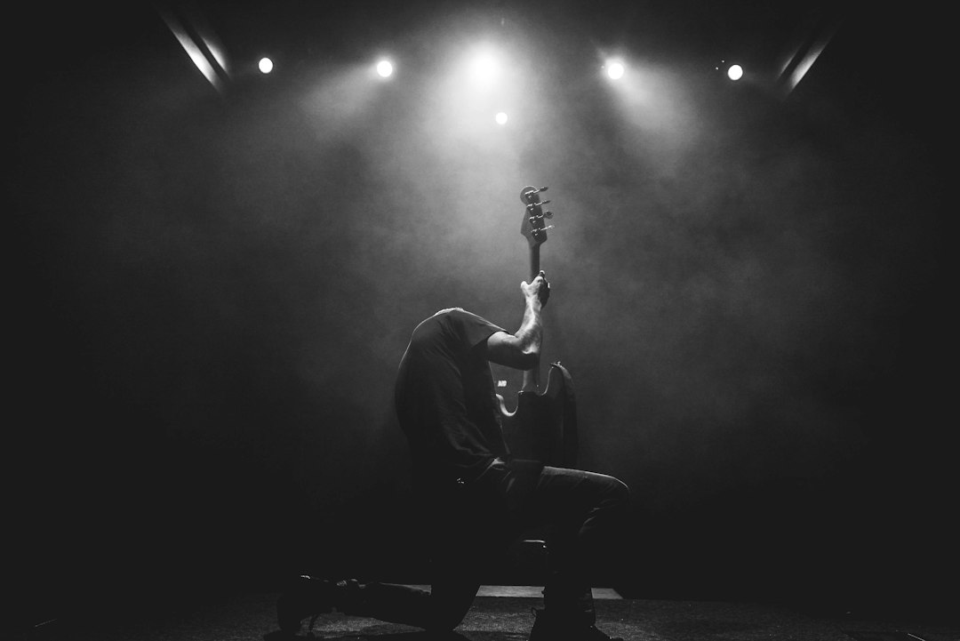 Illustrative live guitar performance for blues musician Otis Taylor's biography