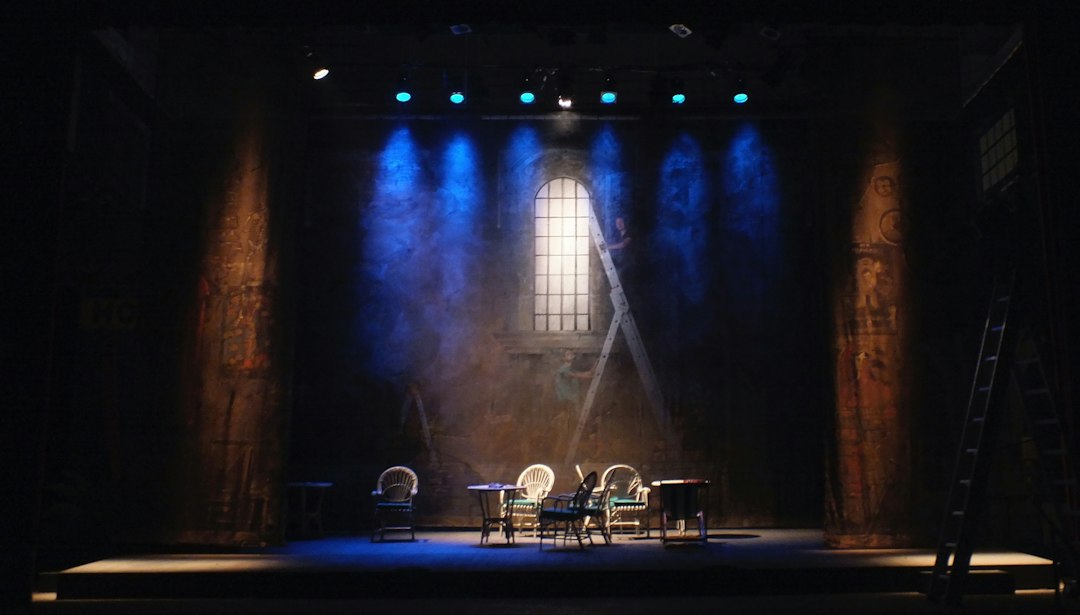 Theatre stage illustrating Norman Wisdom's comedy career; not a portrait